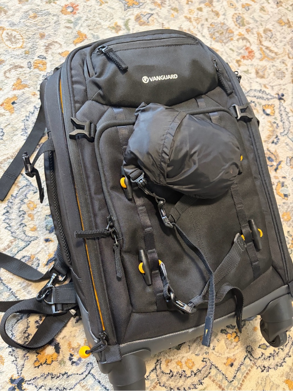 Black Travel Camera Backpack with Yellow Accents